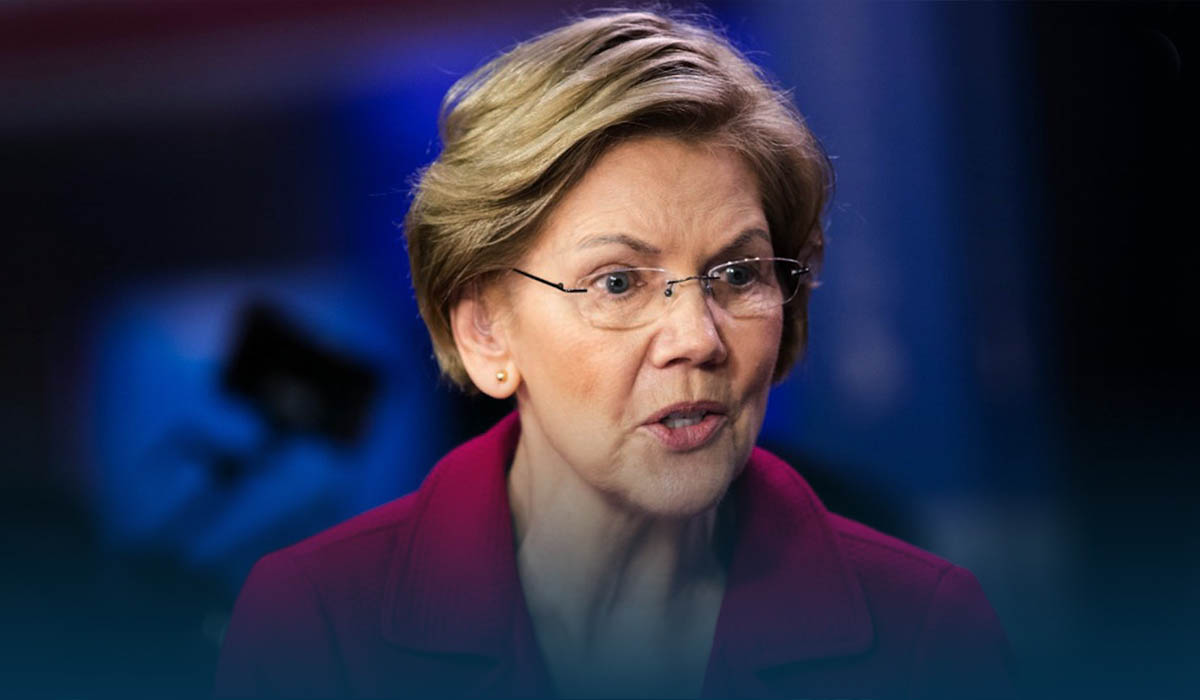 Warren backs Biden in raising record $6 million