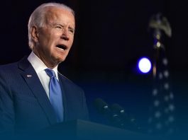 Biden says challenging for U.S. to reach herd immunity by summer's end