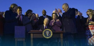Biden Signs 1T Dollars Infrastructure Spending Package into Law