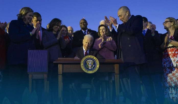 Biden Signs 1T Dollars Infrastructure Spending Package into Law