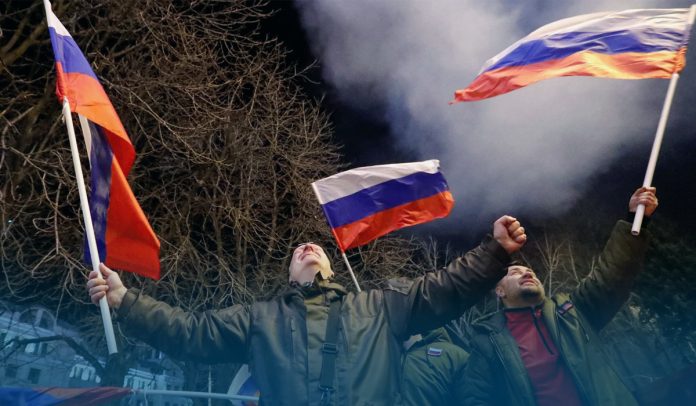US Slaps Sanctions After Russia’s Putin Recognizes Breakaway Ukraine Areas as Independent